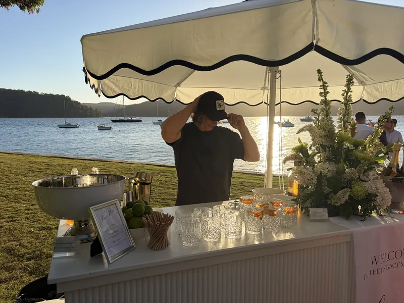 Chilli-rimmed tumblers lined up along the bar at golden hour